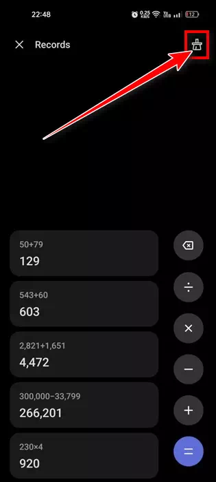 Нажмите на значок сканирования в калькуляторе Realme.